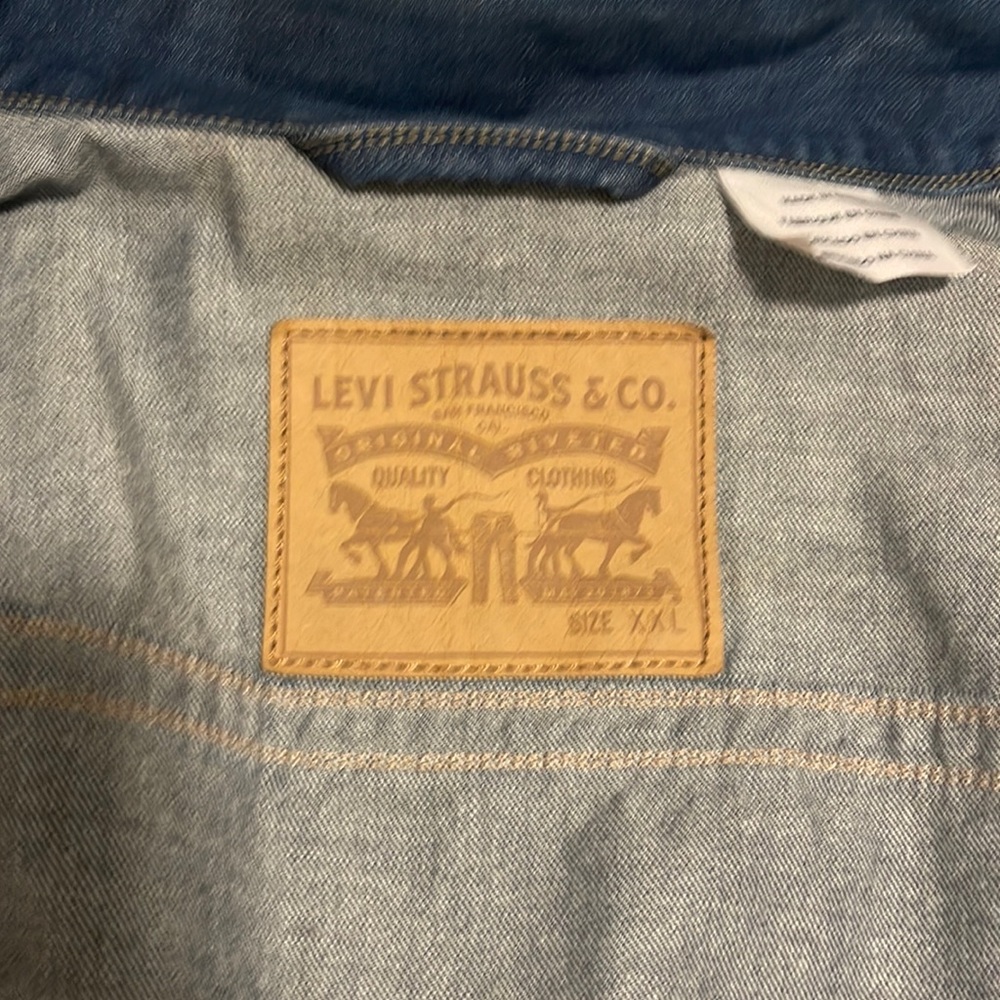 Brand new Levi’s jean jacket only worn once because I have long arms